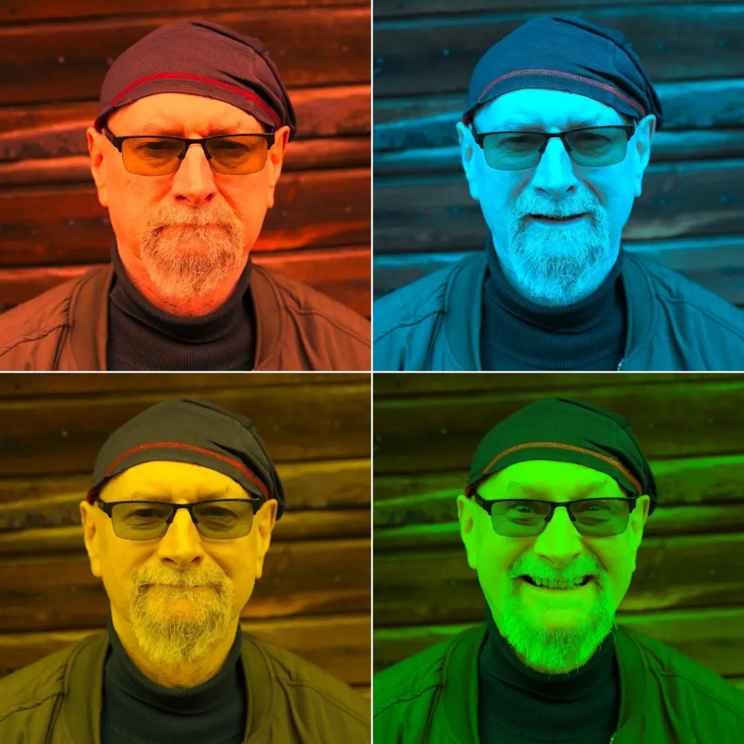 Cztery portrety ułożone w kwadrat. Mężczyzna z siwą brodą w lekko przyciemnionych okularach, na głowie ma ciemną chustkę - buff. Na każdym portrecie ma inny wyraz twarzy i zdjęcia ma inny kolorowy filtr. Poważny - czerwony, lekko otwarte usta - niebieski, lekki uśmiech - żółty, szeroki uśmiech - zielony.